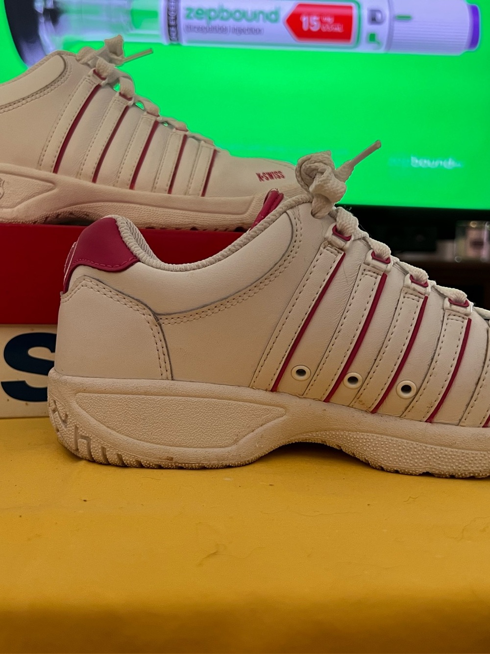 Woman’s White and Pink Athletic Sneakers